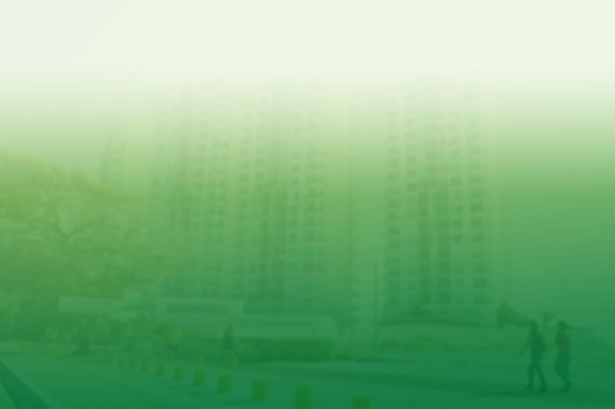 Prédios em desfoque com um degradê verde